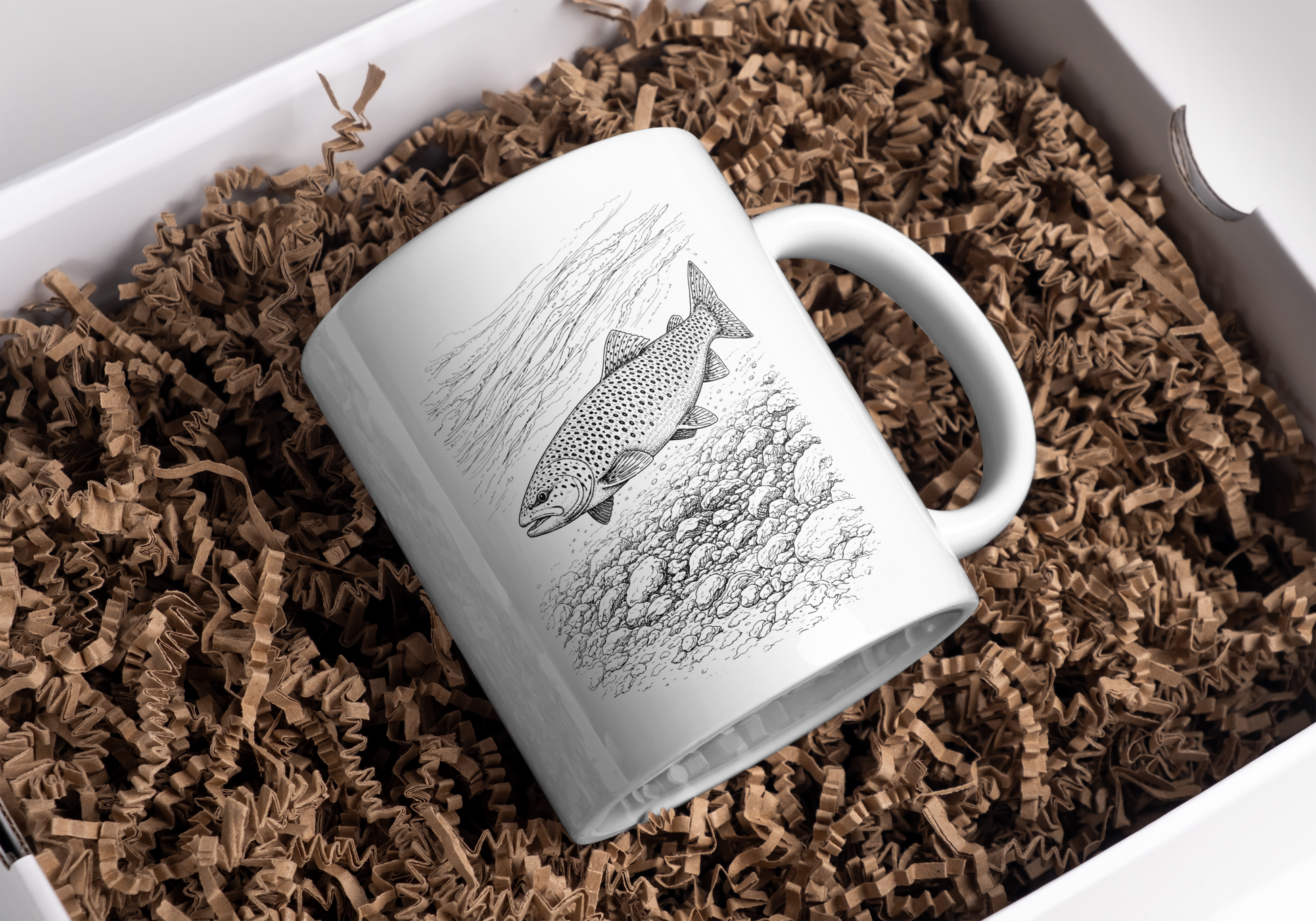 Brown trout illustration ceramic mug in gift packaging with brown paper shreds – wildlife fishing gift